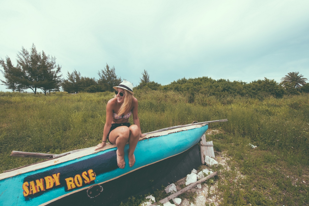 Gilr Playfully Laughing Whilst Sitting On A Boat At The Beach 1024x683 1
