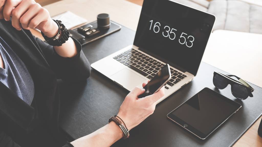 Man Checking Phone 1024x576 1